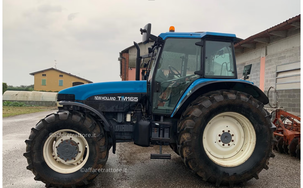 New Holland T165 Usado - 1