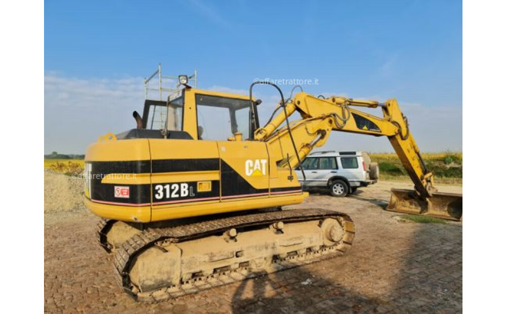 Caterpillar 312BL Usado - 1