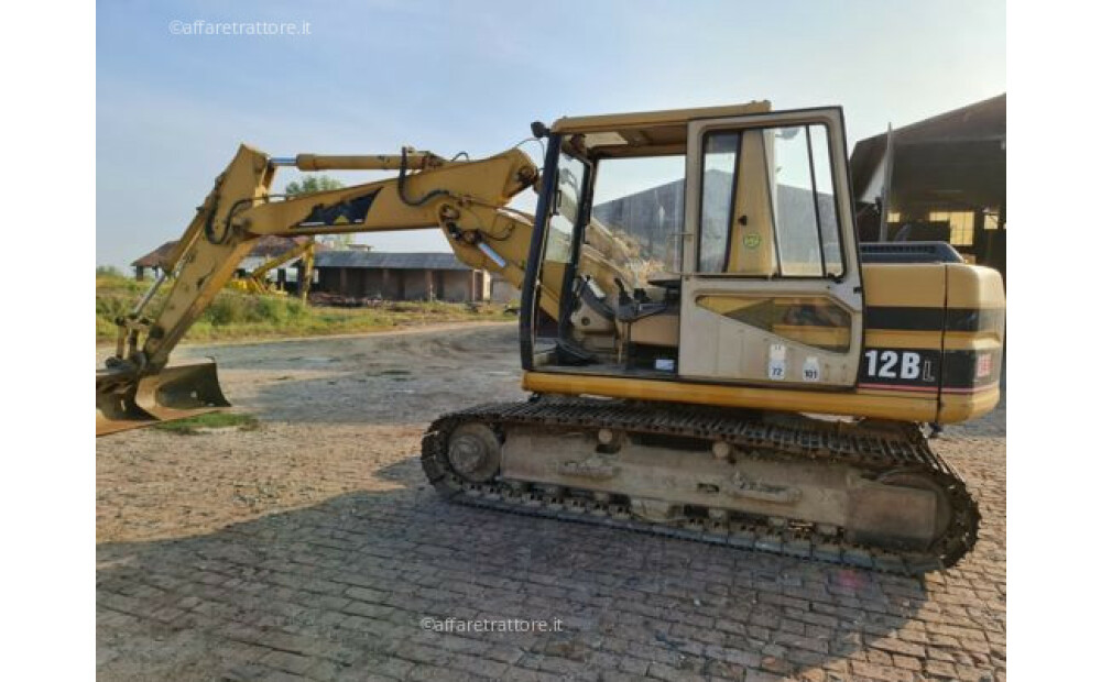 Caterpillar 312BL Usado - 6